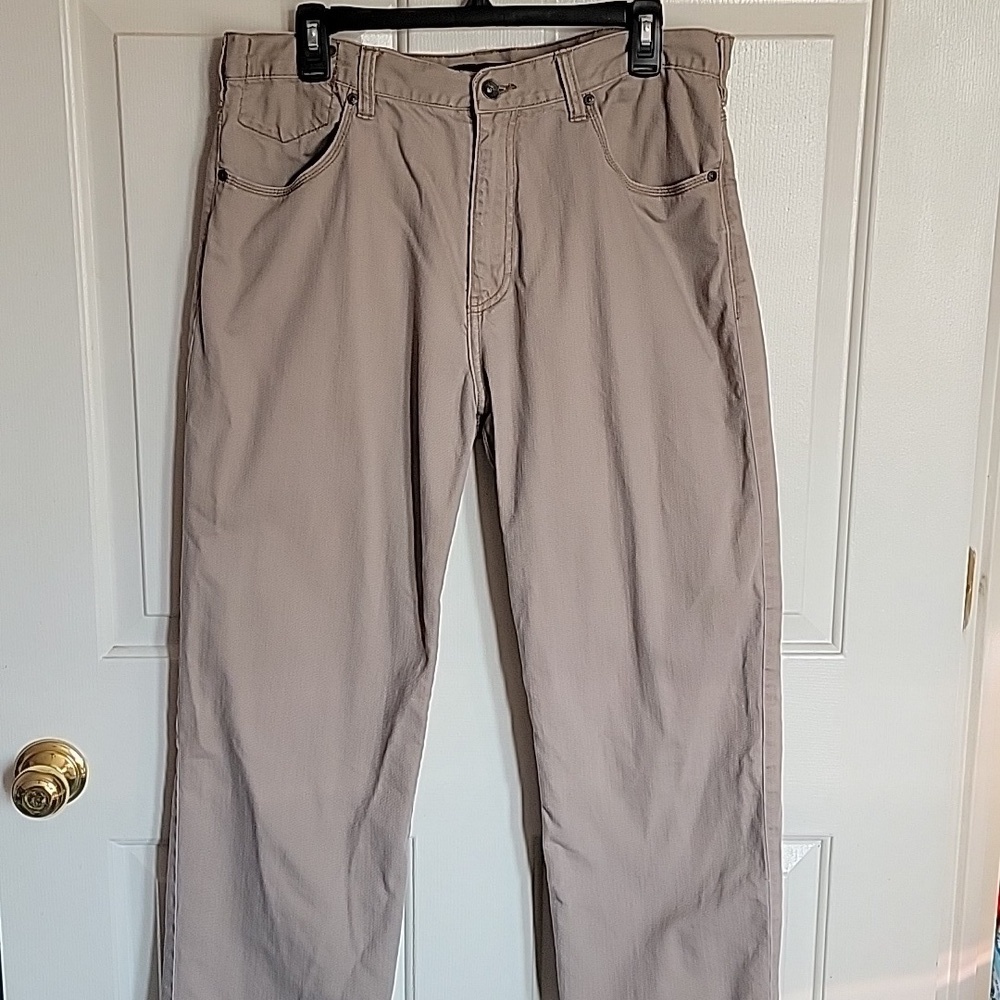 Calvin Klein men's straight leg jeans, tan. Size 36.